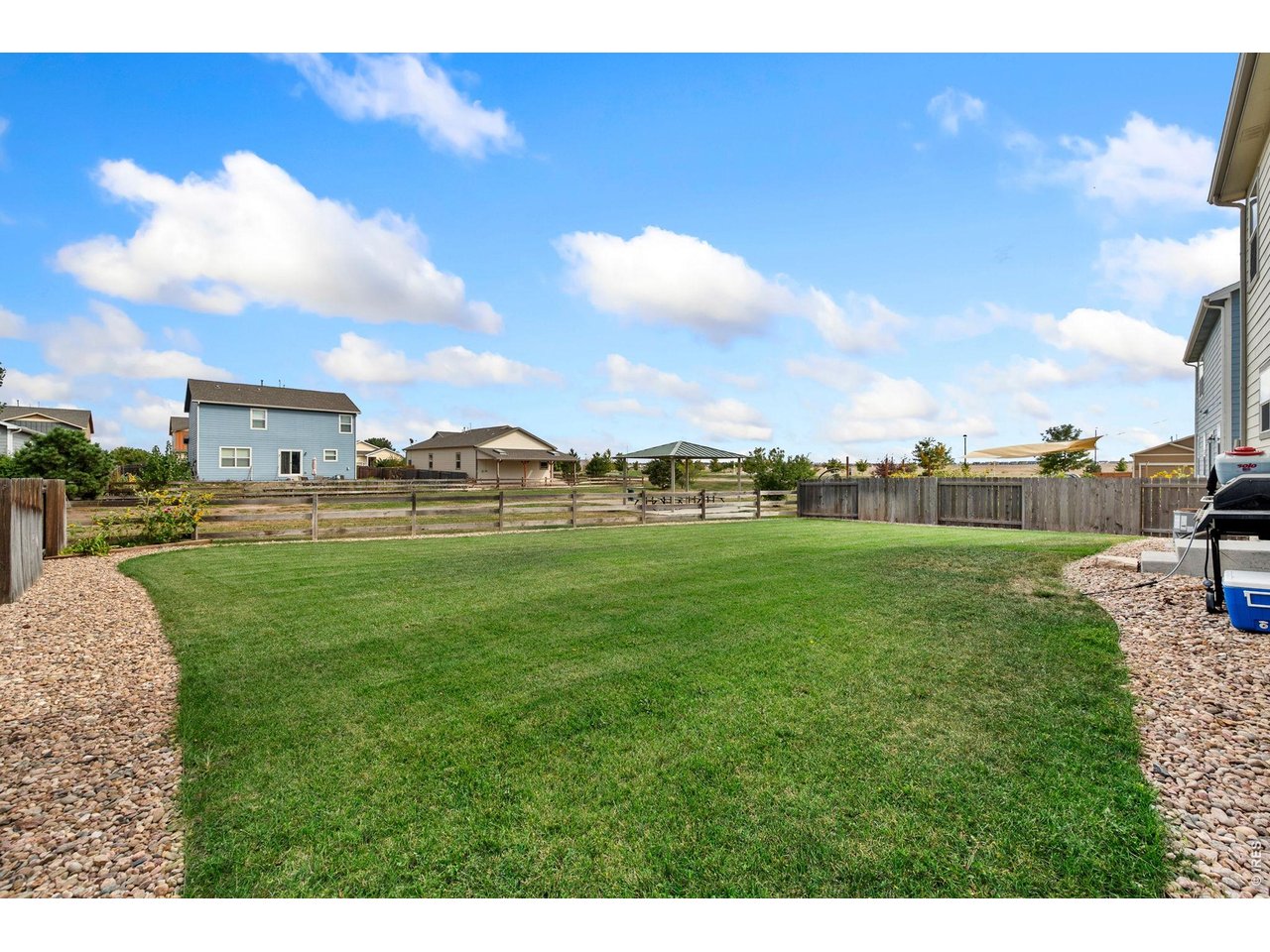 Property Photo 24 Large well-maintained yard backing to HOA open space