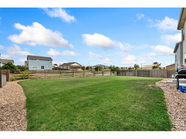 Property Photo 24 Large well-maintained yard backing to HOA open space