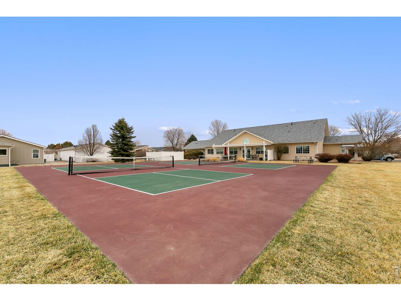Property Photo 21 Make friends on the pickleball courts.