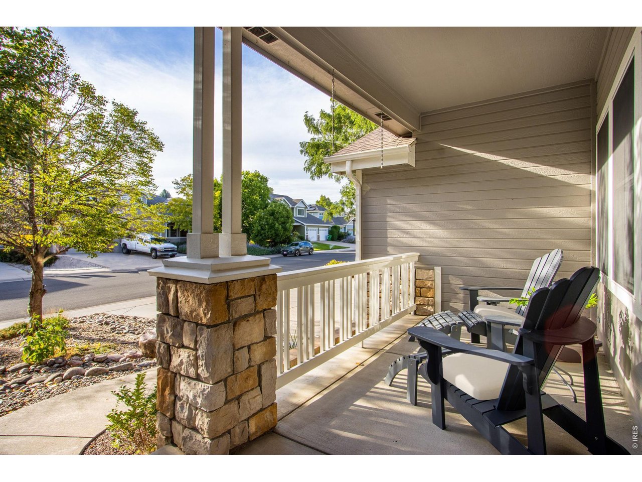 Property Photo 2 Sunny & Bright, West Facing, oversizing front porch and low-maintaince front yard, Xeriscaped!