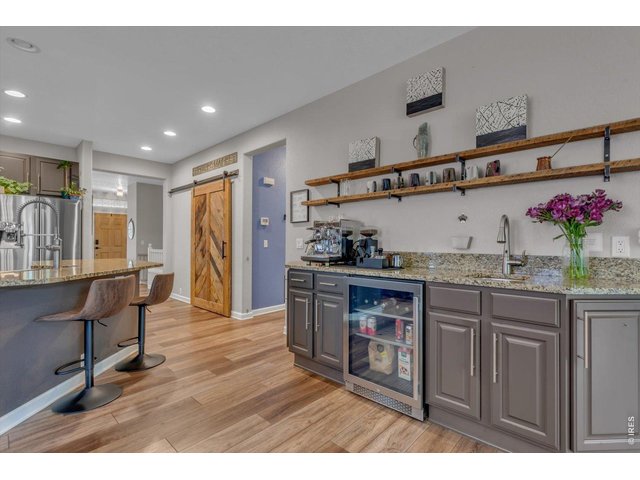 Property Photo 13 wine fridge and wet coffee bar (or chef's sink)