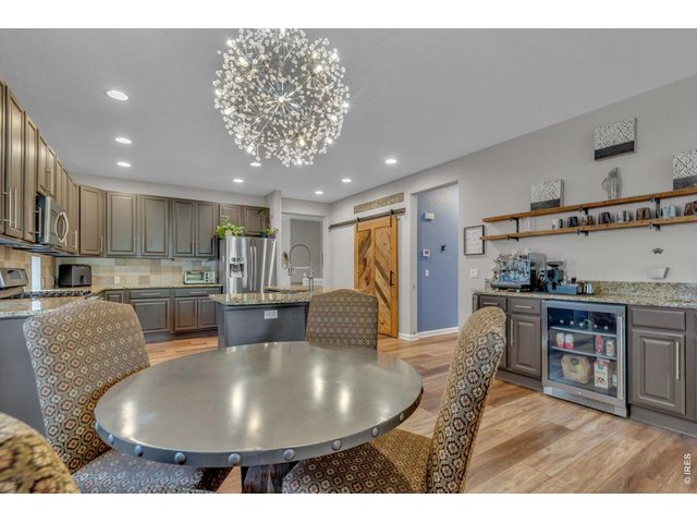 Property Photo 12 eat-in kitchen area with wet coffee bar