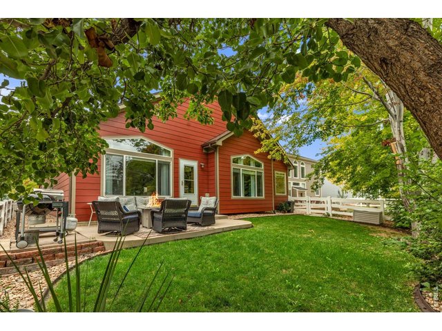 Property Photo 21 step out from the family room to the outdoor entertaining patio