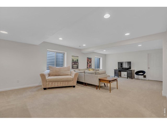 Property Photo 36 lower level recessed lighting and egress windows