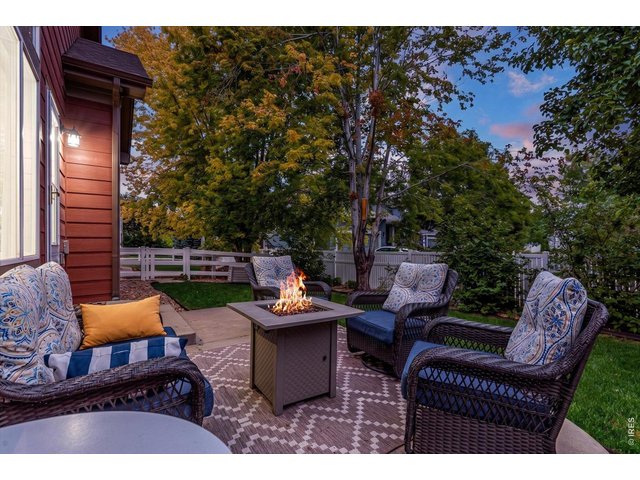 Property Photo 47 backyard patio and grill area