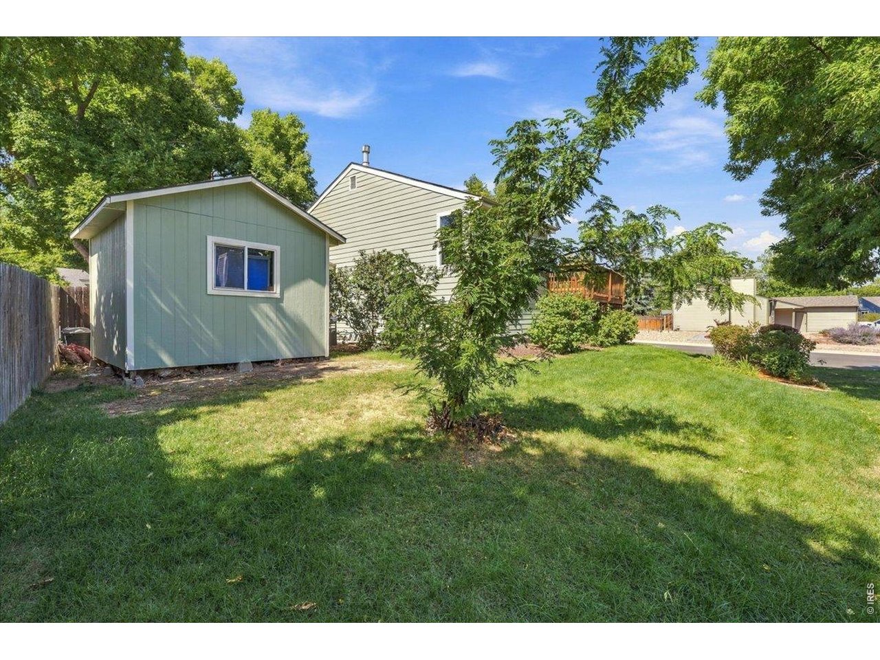 Property Photo 8 Good sized shed for additional storage!