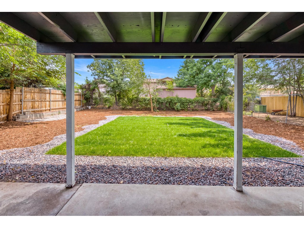 Property Photo 32 Backyard with covered back patio and new landscaping