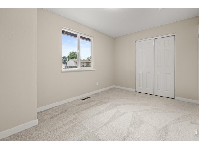 Property Photo 15 Front bedroom