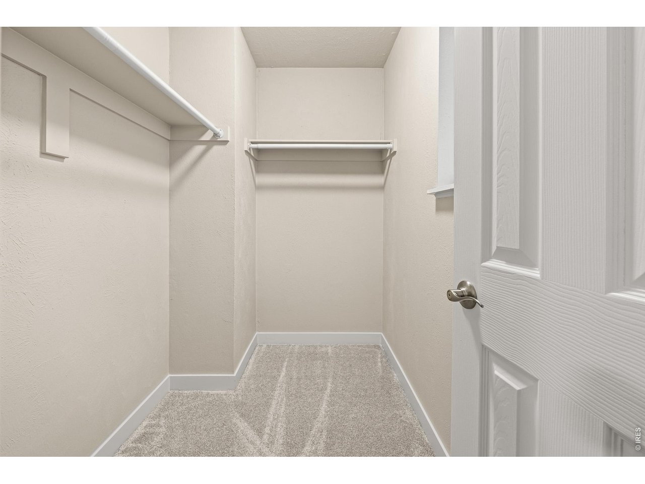 Property Photo 21 Primary bedroom walk in closet