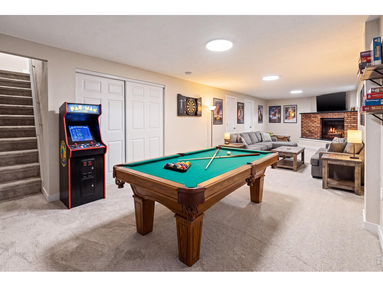 Property Photo 24 Basement rec room - virtually staged.