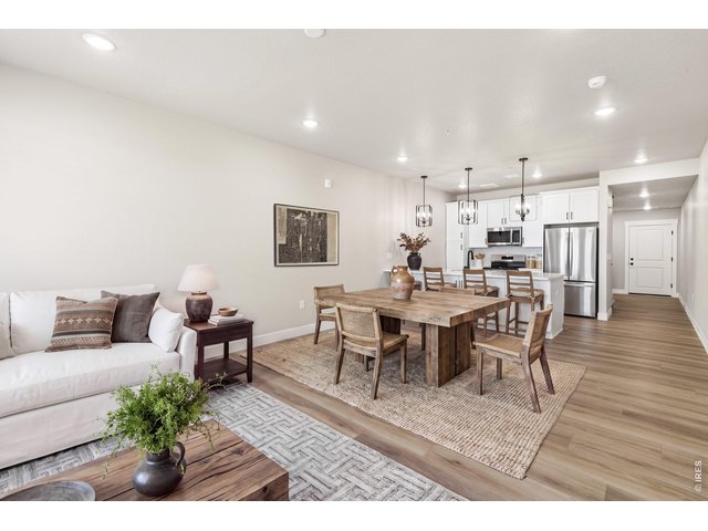 Property Photo 1 Welcome home ot 968 Bridwhistle Ln #5. Photos of the actual unit, virtually staged.