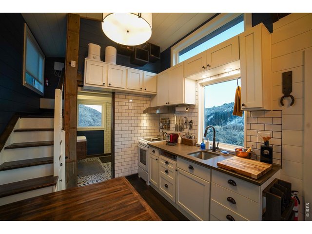 Property Photo 10 Kitchen, bath, and loft layout