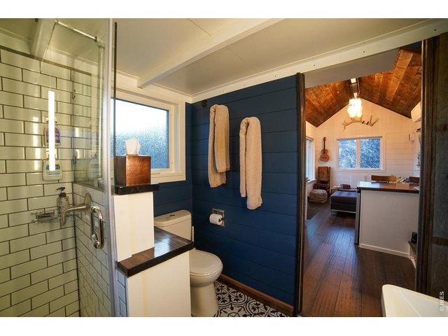 Property Photo 18 Bathroom, kitchen, and living room layout