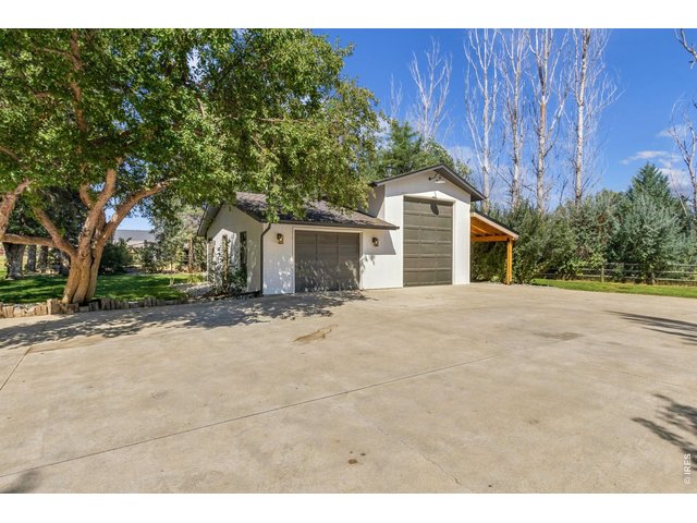Property Photo 31 Detached 2 car garage with RV space and carport