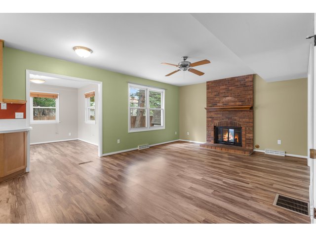 Property Photo 3 Family room with gas fireplace