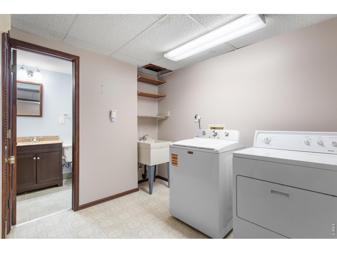 Property Photo 25 Basement Laundry and Utility Room with entrance to Basement Bathroom
