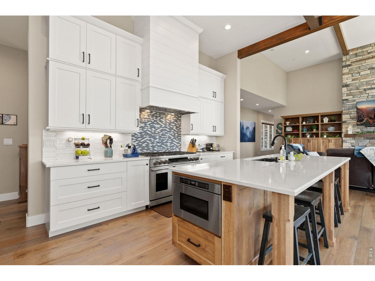 Property Photo 23 12' ceilings open up the gourmet kitchen space.