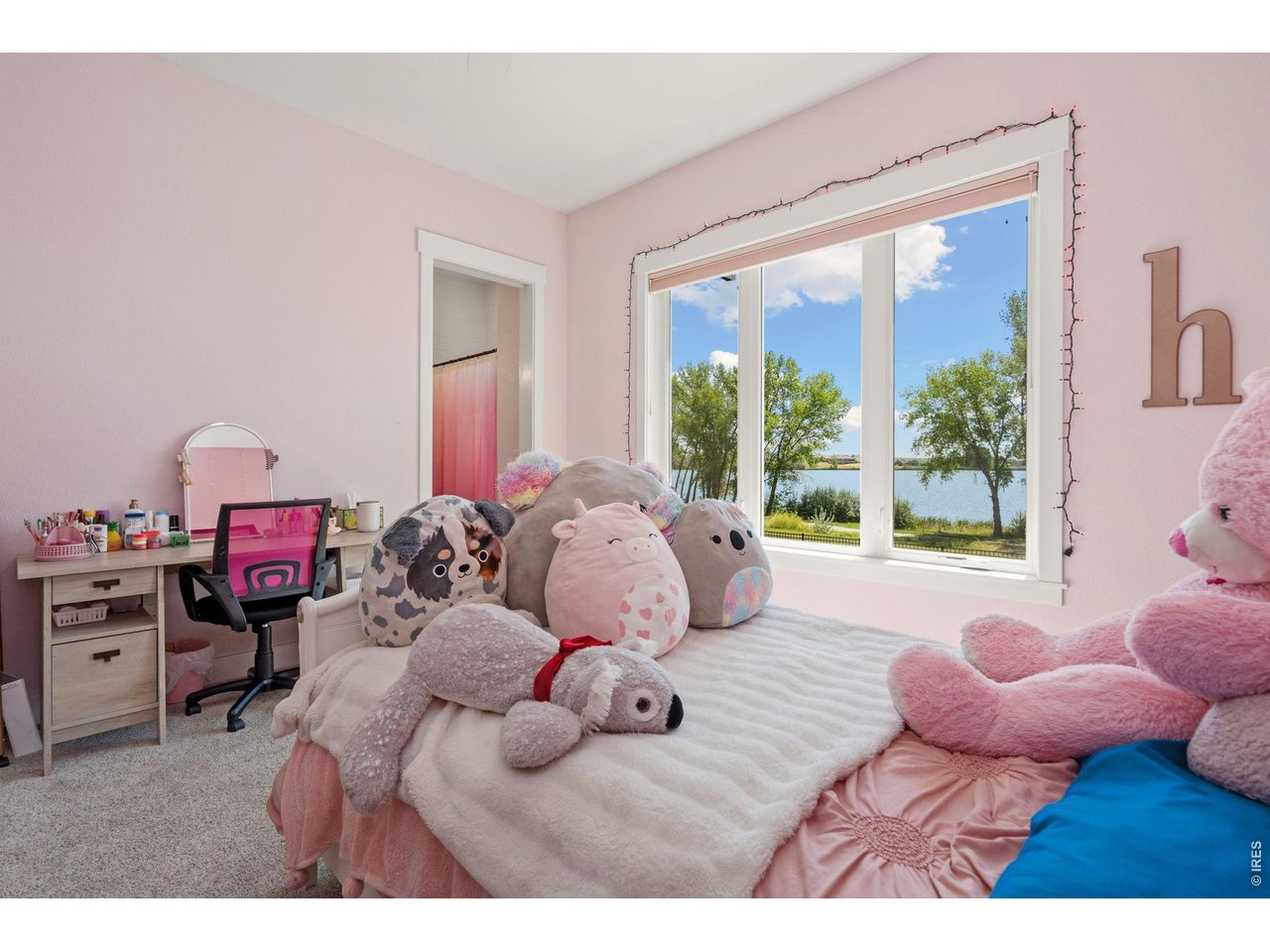 Property Photo 35 3rd main floor bedroom with lake views.