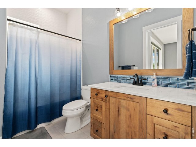 Property Photo 34 2nd bedroom has a full attached bathroom and walk-in closet.