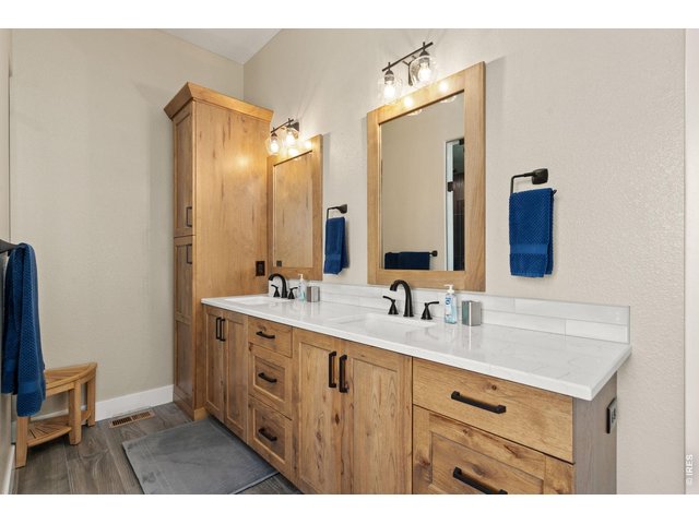 Property Photo 32 Plenty of bathroom storage with access to a large walk-in closet!