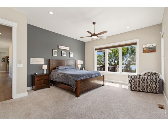 Property Photo 29 Retire to your relaxing, expansive master bedroom.