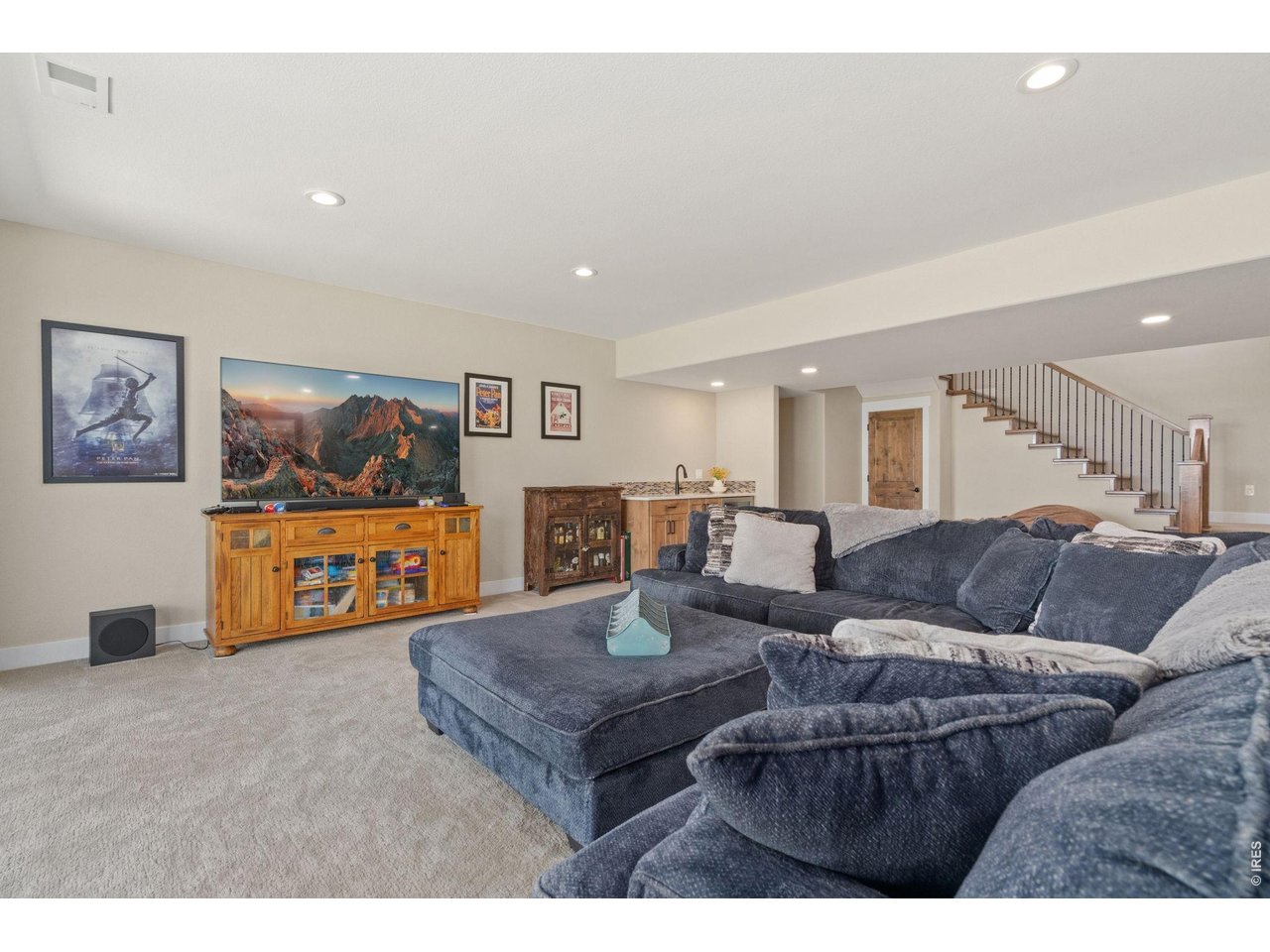 Property Photo 40 Enjoy movie nights in your spacious basement living room.