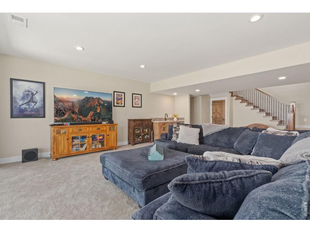 Property Photo 40 Enjoy movie nights in your spacious basement living room.