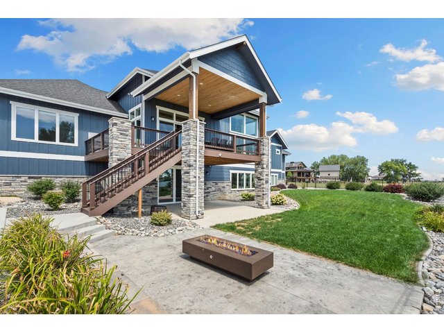 Property Photo 11 Cozy up for smores around your glass and lava rock fire pit.