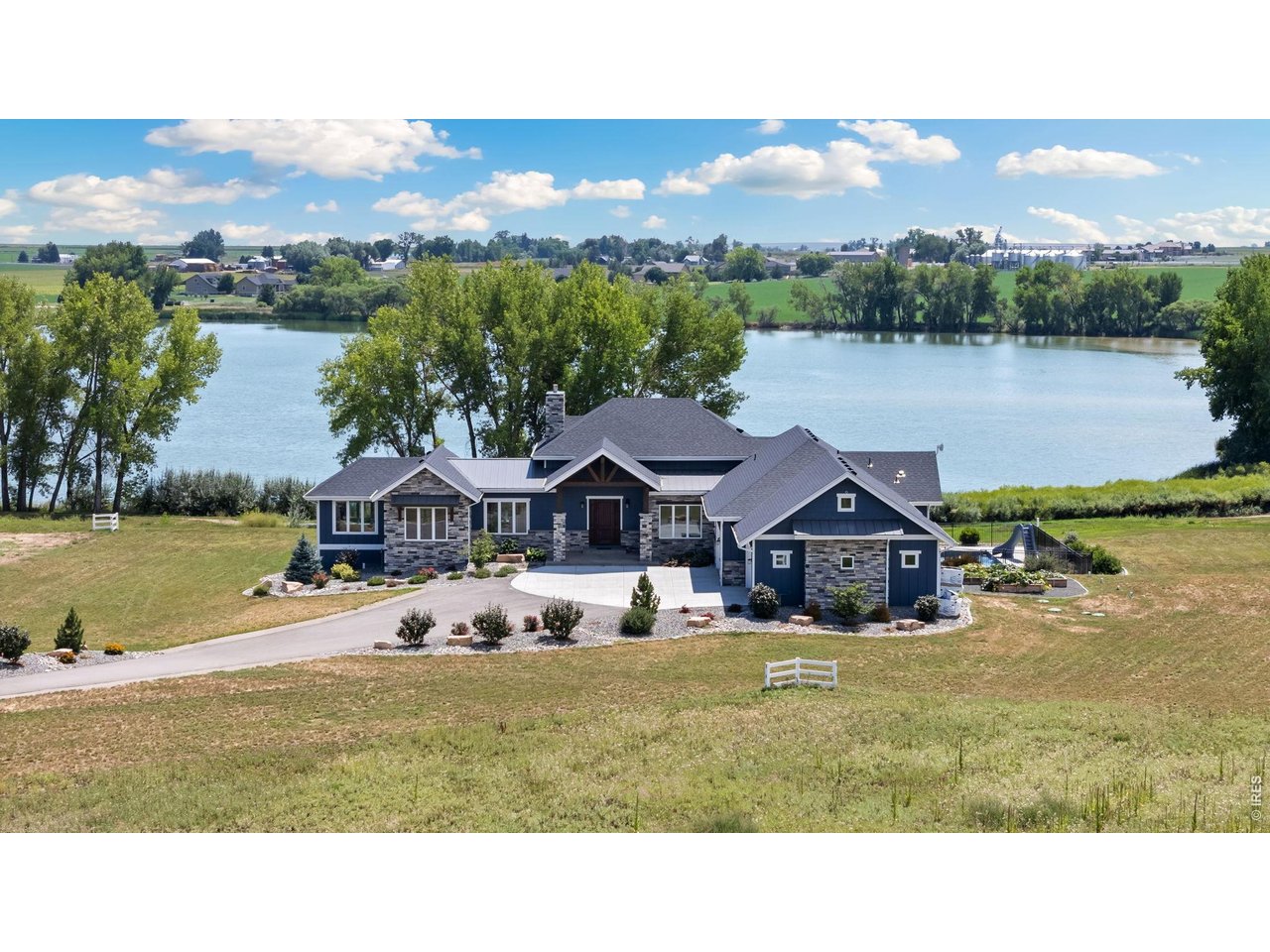 Property Photo 1 Come home to 3324 Fox Crossing Place! Luxury, resort style, lakefront living at its finest!