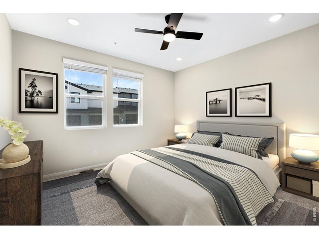 Property Photo 10 Primary Suite Virtually Staged