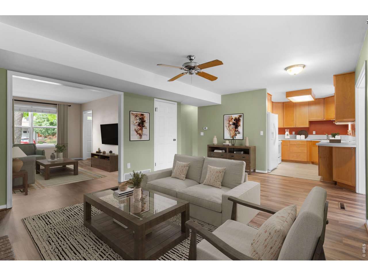Property Photo 2 Family Room, Living Room and Kitchen (with virtual staging)