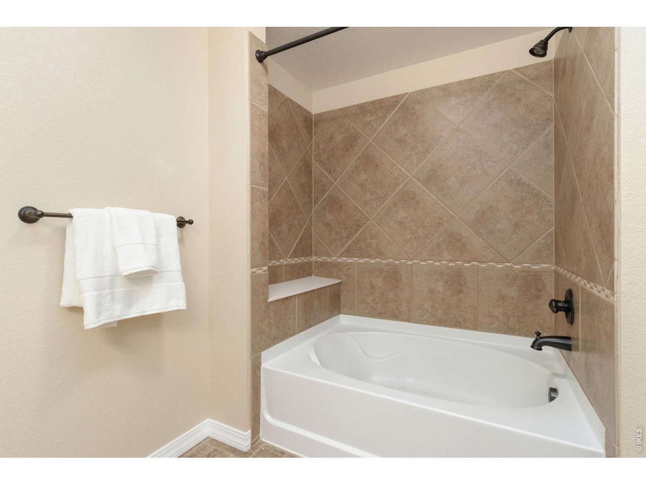 Property Photo 13 Primary Bathroom with tub