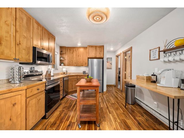 Property Photo 9 Functional kitchen with plenty of counterspace