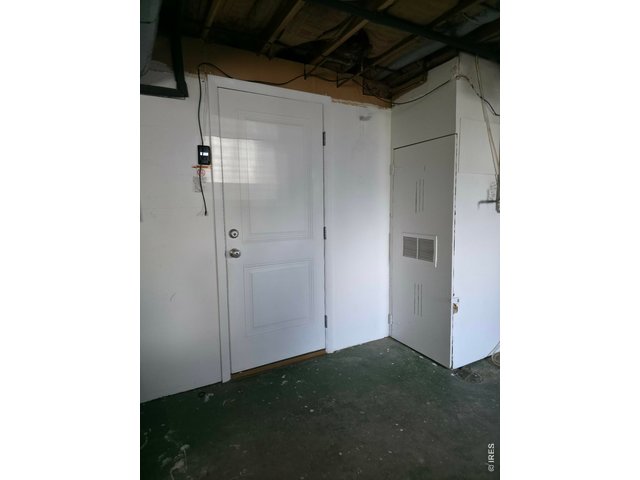Property Photo 38 Access to the third bath and lower level laundry from the garage