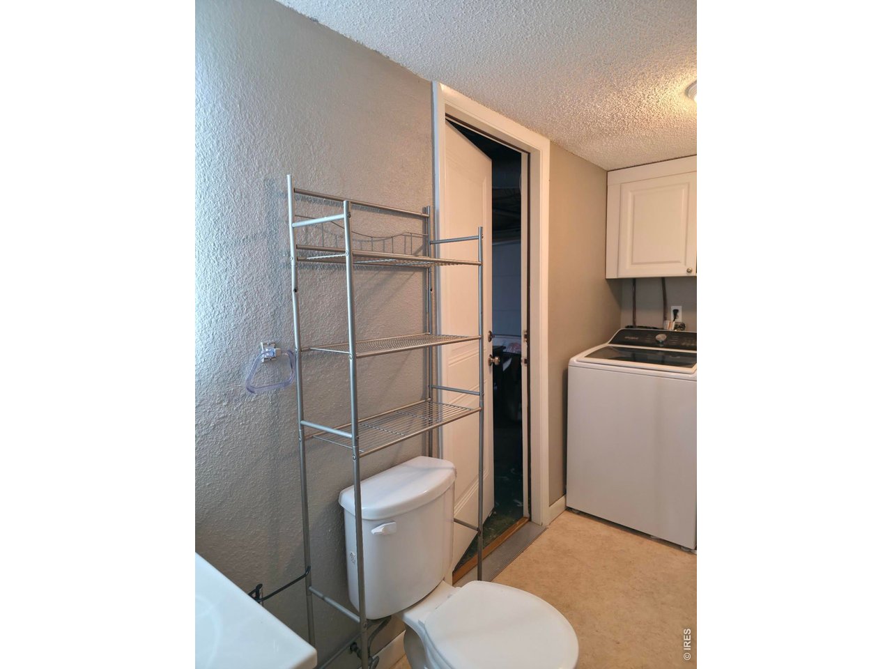 Property Photo 34 Garage access from the lower lever bath and laundry room