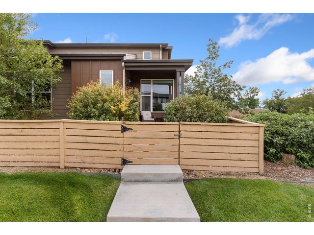 Property Photo 2 End unit townhome with private front yard.