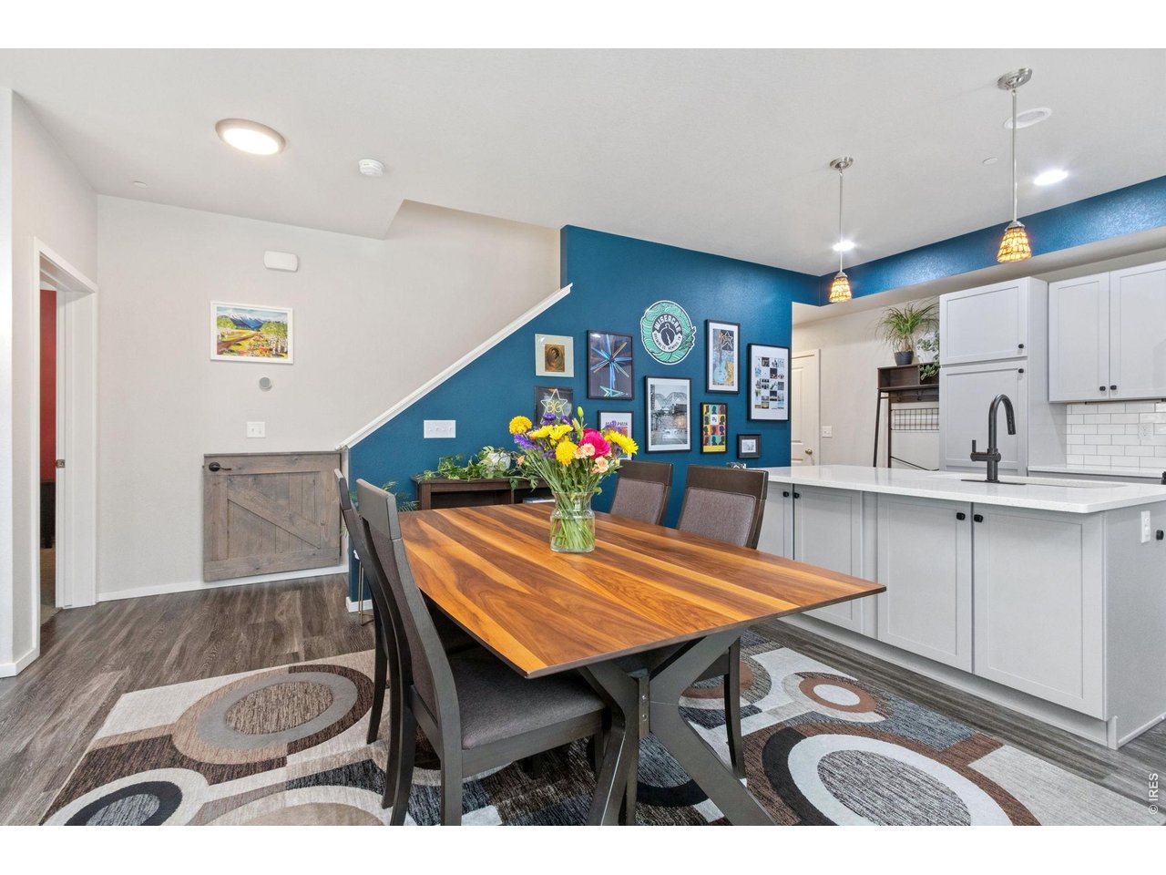 Property Photo 11 Dining into kitchen area with informal dining at the island.