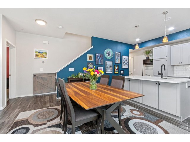 Property Photo 11 Dining into kitchen area with informal dining at the island.