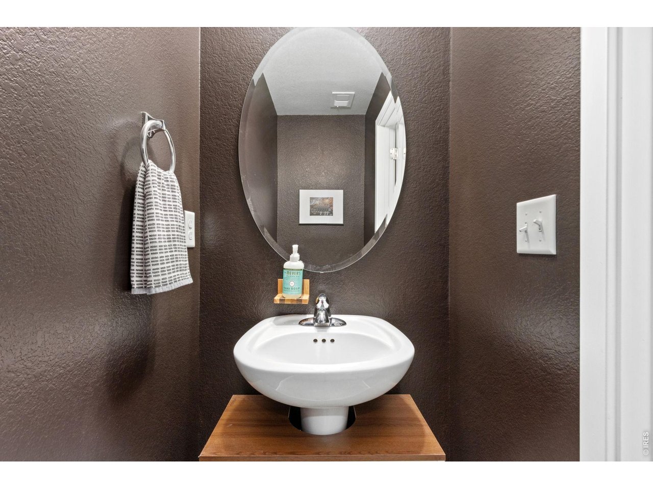 Property Photo 21 Main level 1/2 bathroom great for guests.