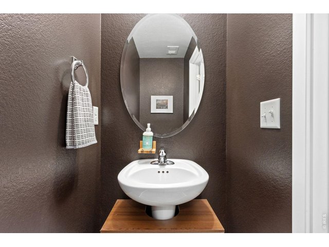 Property Photo 21 Main level 1/2 bathroom great for guests.