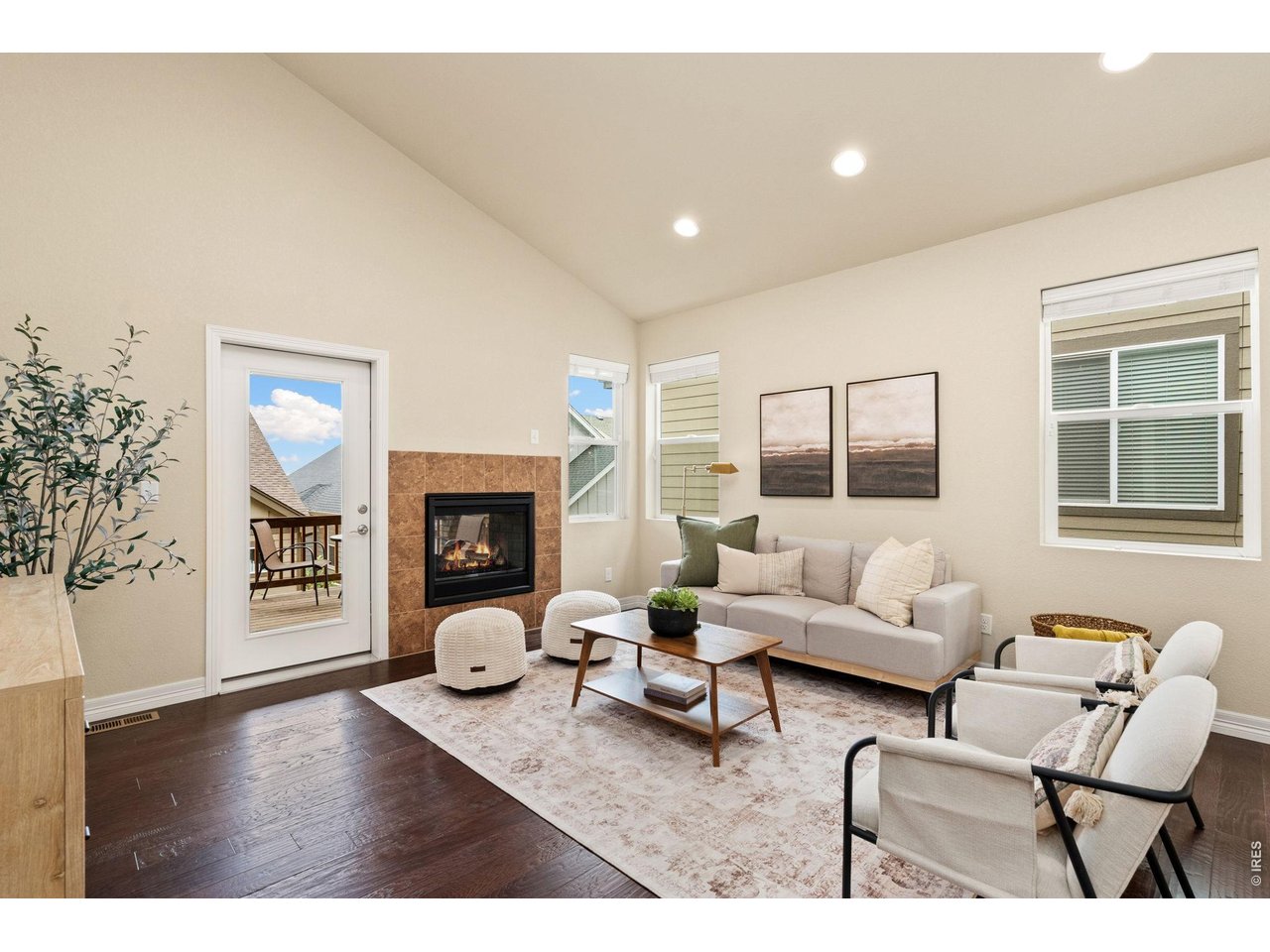 Property Photo 5 Living room with 2 sided fireplace
