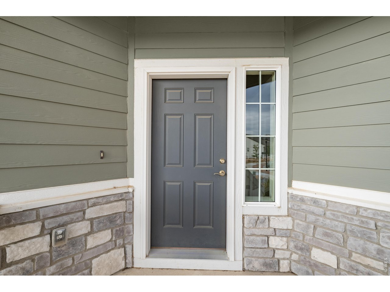 Property Photo 11 Front Entry with side window.