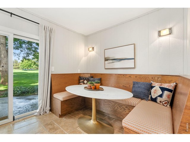 Property Photo 27 Sunroom built-in corner booth included!