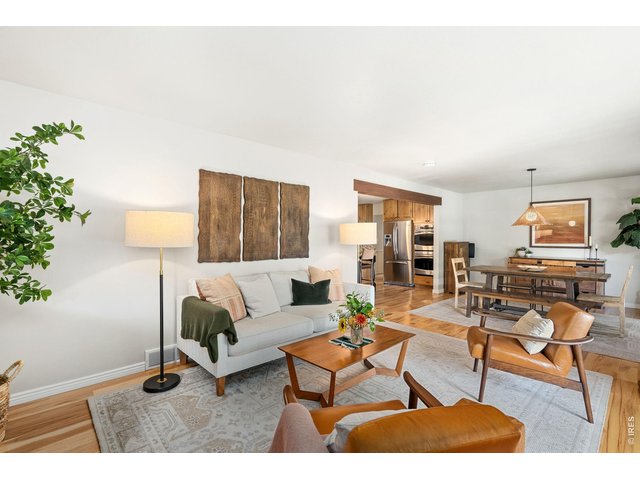 Property Photo 11 Dining and living open layout.
