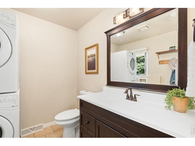 Property Photo 38 Powder bath and laundry.