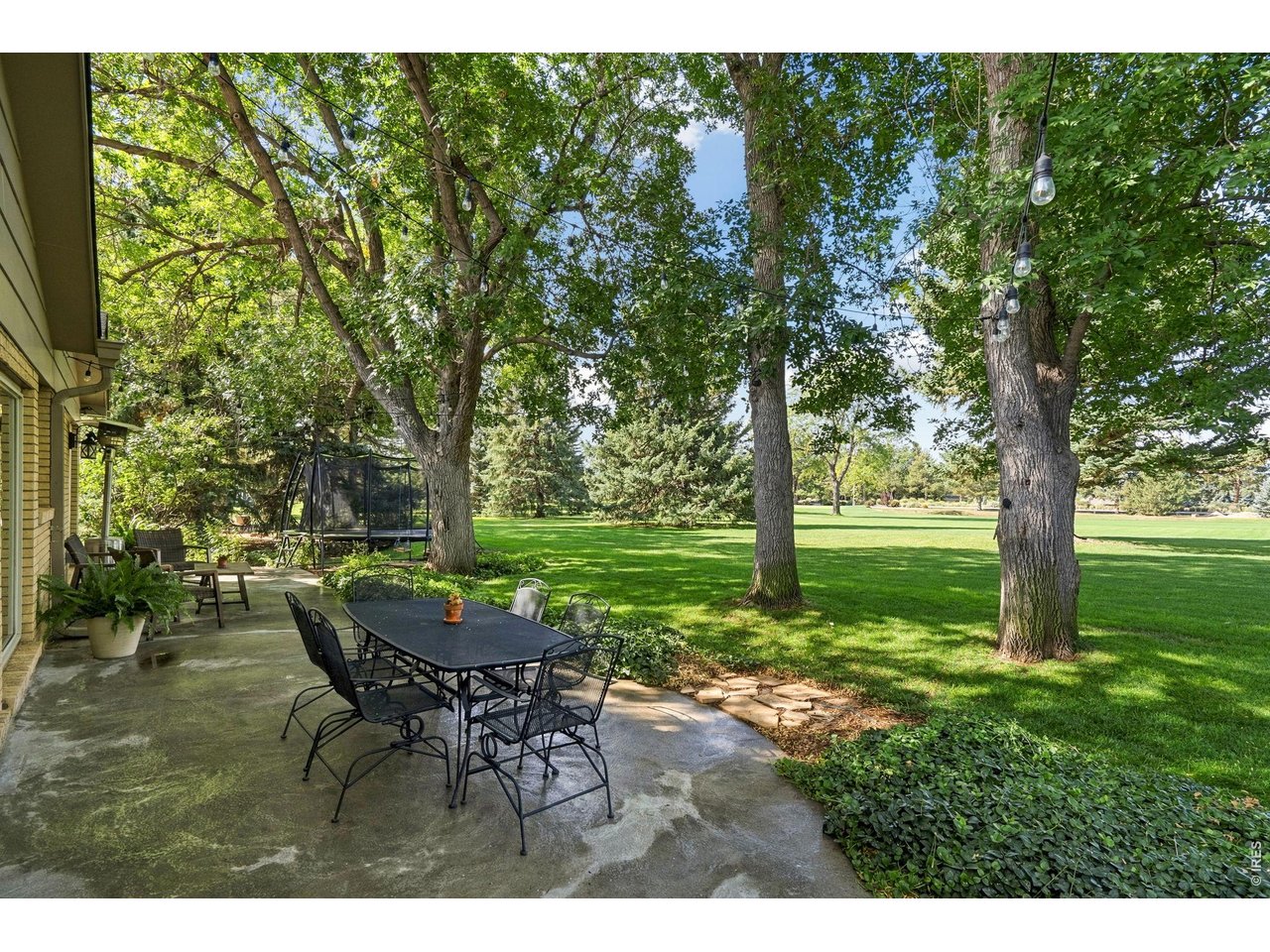 Property Photo 41 Back patio facing golf course.