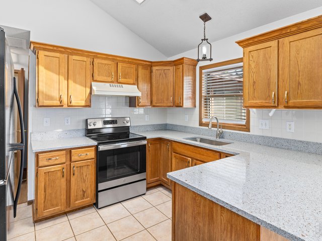 Property Photo 17 Brand new quartz counters, sink, faucet and disposal