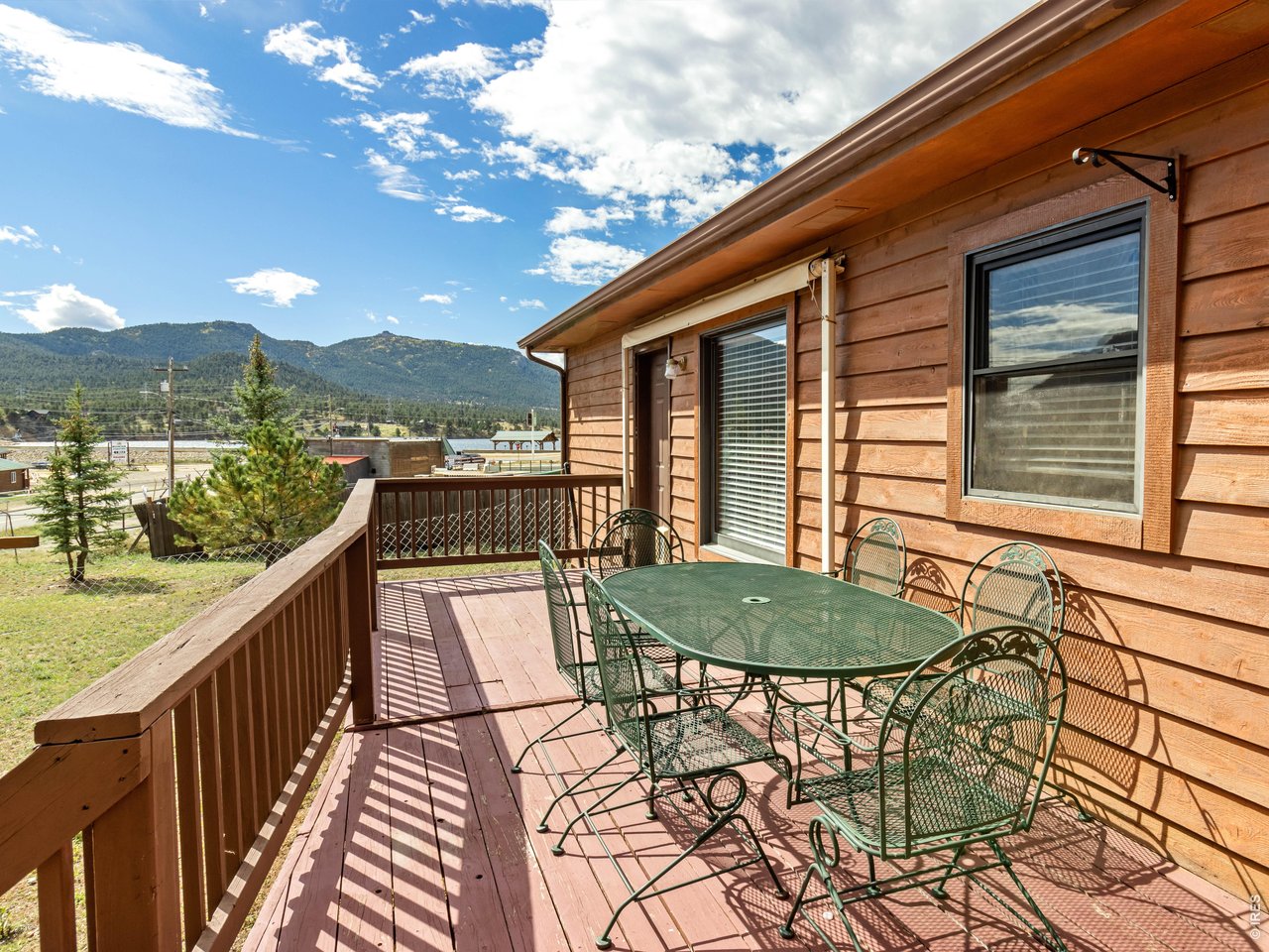 Property Photo 31 Eastern deck with lake & mountain views