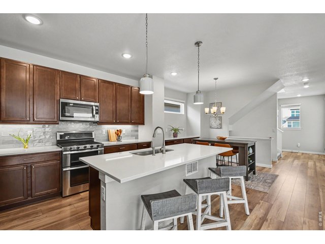 Property Photo 4 Kitchen includes all appliances with gas stove and walk-in pantry.