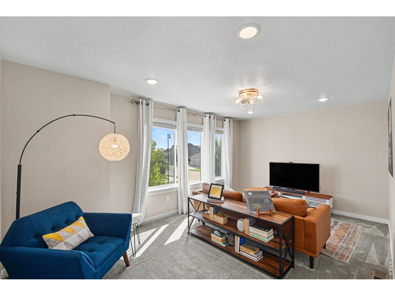 Property Photo 11 Upstairs loft makes a great 2nd living room or workout area